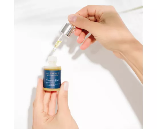 زيت إكسير مكافح للشيخوخة نهاري وليلي من ألكمي نايتشرز دي إن آي - 15 مل